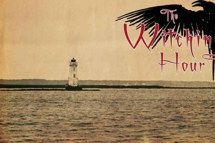 a man flying a kite in a large body of water